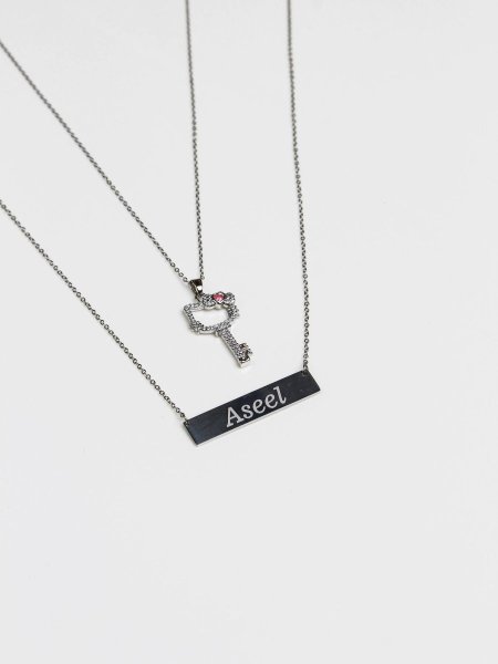 سنسال طبقتين مع نقش الاسم