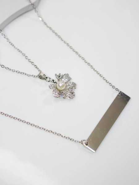 سنسال طبقتين مع نقش الاسم